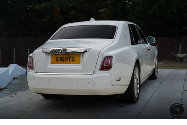 Rolls Royce Phantom 8 rear view, showcasing its timeless and distinctive tail lights.
