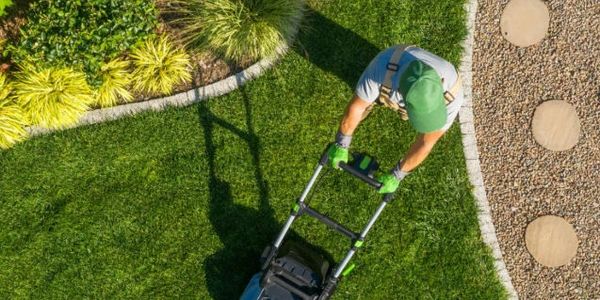 Our crew mowing a lawn in Osceola.