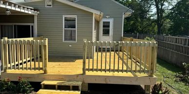A new deck and sunroom addition.