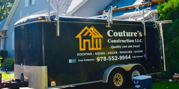 Coutures Construction trailer parked at a clients home