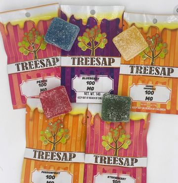 Colorful Treesap gummy edibles in various flavors and 100 mg dosage.