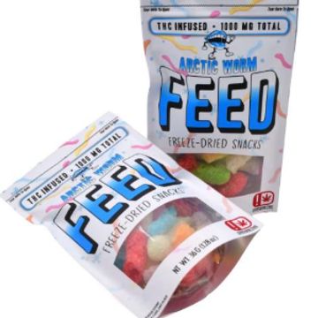 Two bags of Arctic Worm Feed THC-infused freeze-dried snacks.
