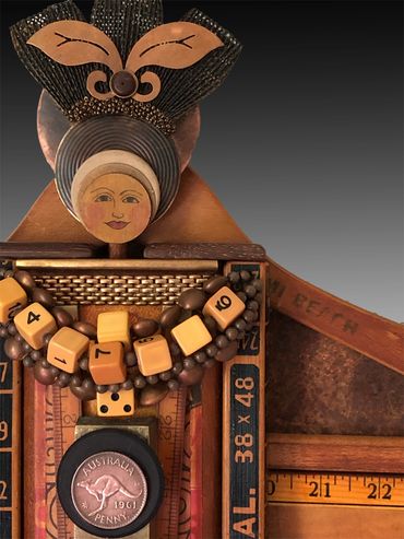 Mixed media assemblage artwork designed to hang on the wall. An inspirational artwork created out of