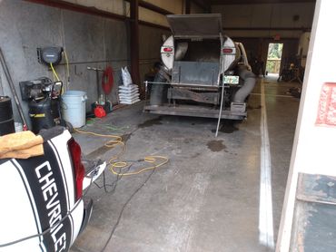 Street sweeper hatch. Fabricated of diamond plate and flat bar steel.