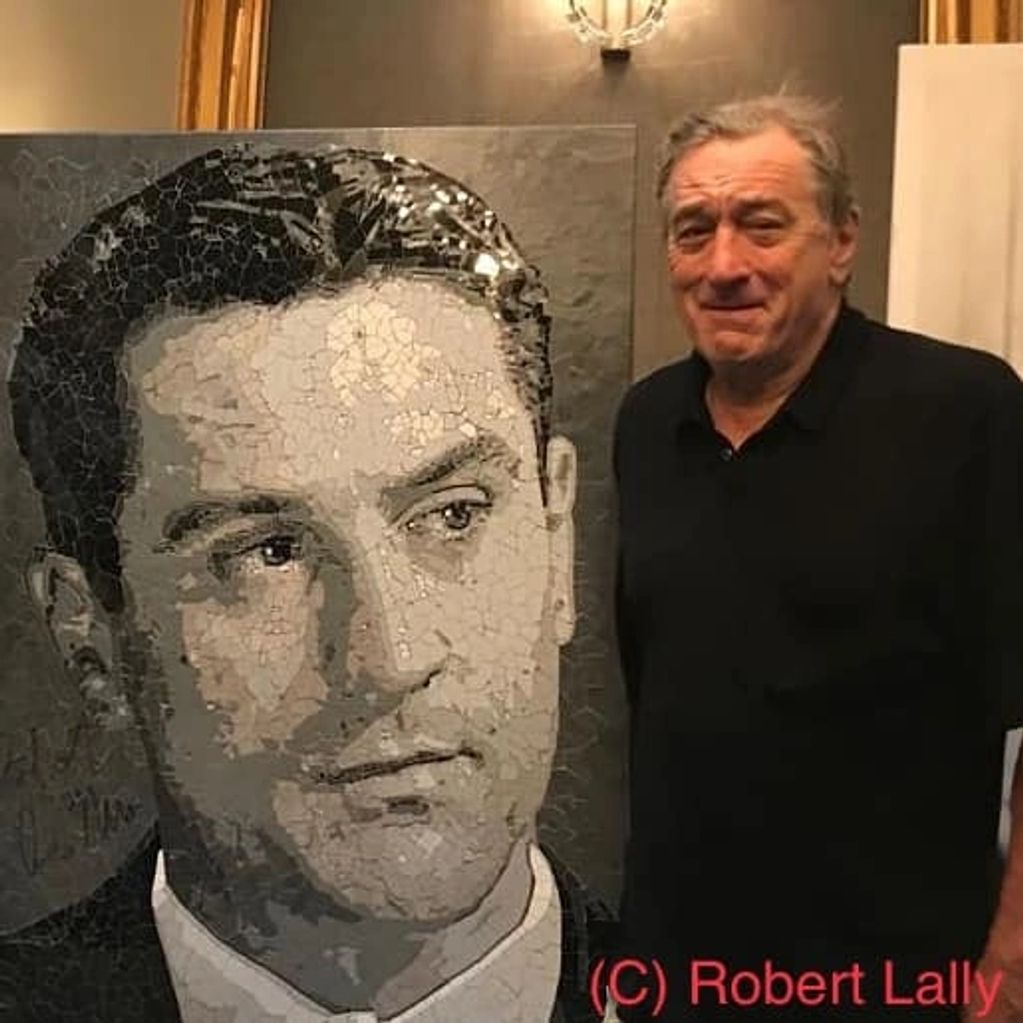 Robert De Niro with his mosaic artwork by Robert Lally.