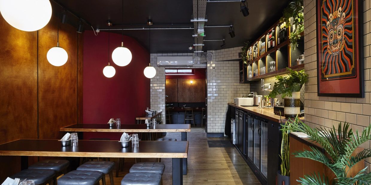 commercial project for Coq fighter soho branch banquette seating custom made leather upholstery
