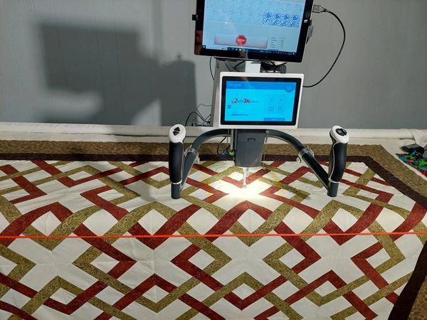 Close-up of computerized quilting interface.