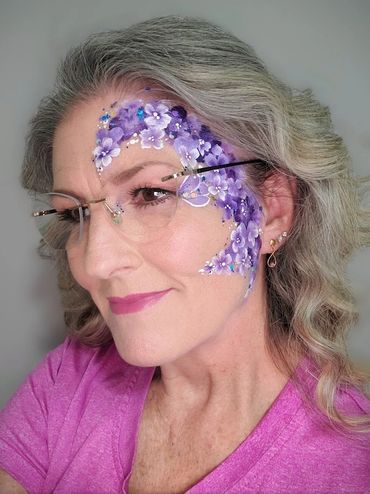 Inspired by Samona Rad, artist self painted lilac floral face paint face framed