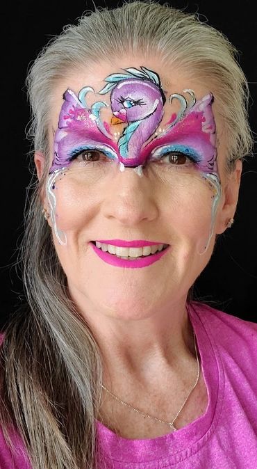 Inspired by Freda Haas, Peacock face paint crown.