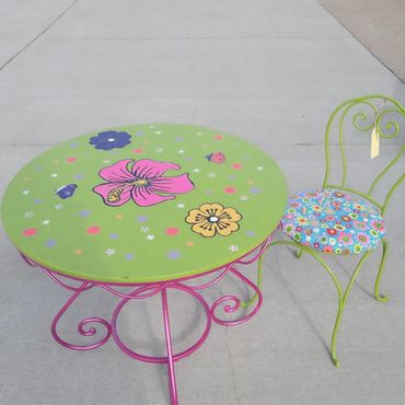 Fun children's size table and chair. Hand painted. Pink chrome table legs. SOLD