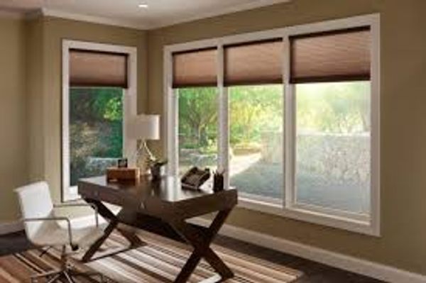 Sun room automated shades by Lutron.