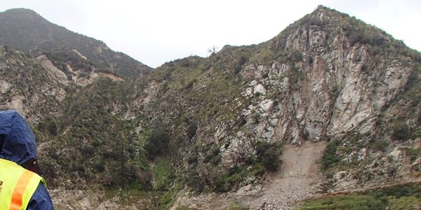 Rockfall scarp above dam