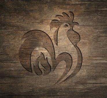 logotype carved on wood