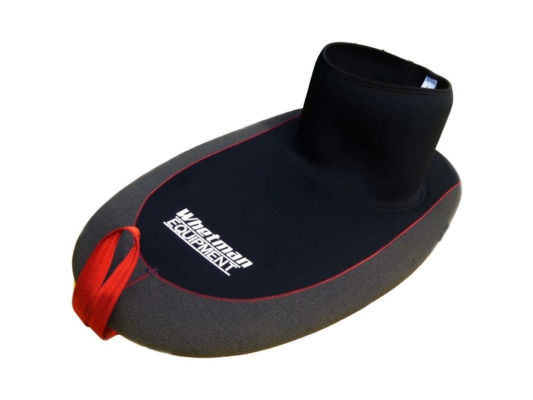 Whetman neoprene spray skirt for a sea kayak with "Whetman equipment" logo.