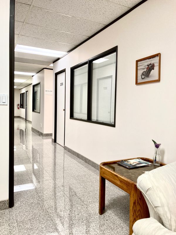 Luxurious granite flooring on hallways. office for rent at Wright Business Centre, Calgary SE