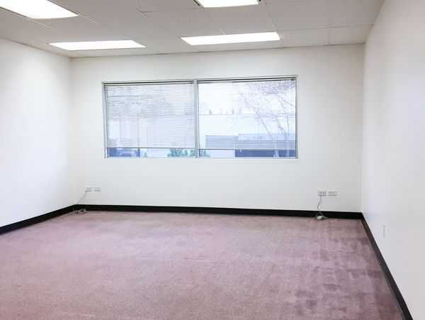 Bright clean office for rent in Calgary SE, at Wright Business Centre. View to the outdoors.