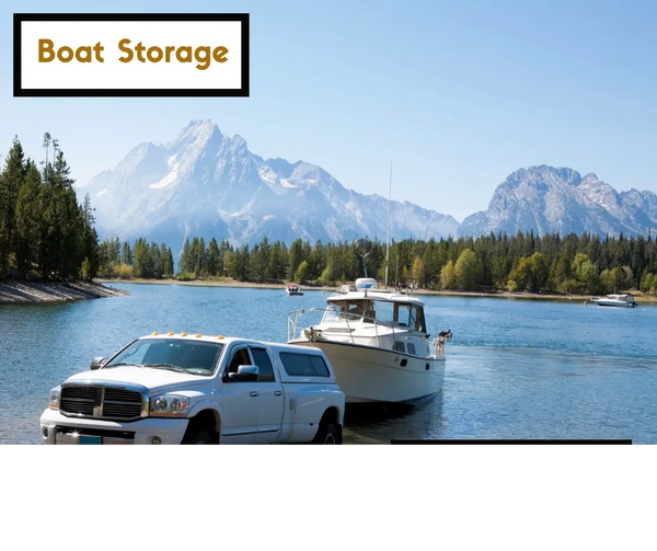 Boat being towed with a truck at a boat launch