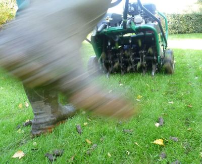 Leeds Lawn Care aerating a lawn in Leeds