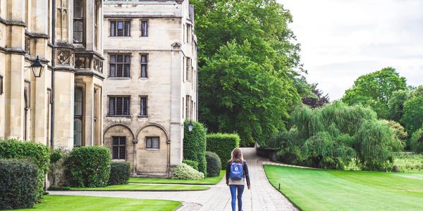 A student walking through Cambridge University
