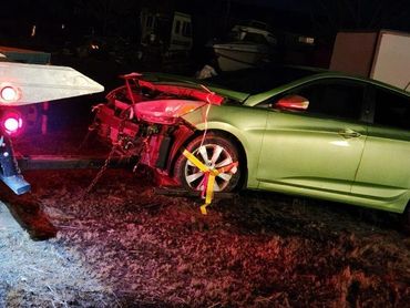 Tow truck Recovering a wrecked vehicle