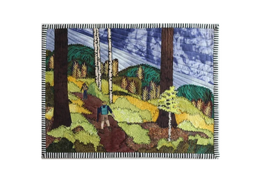 Art quilt showing hikers in a forest