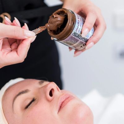 Woman having a peel at UpGrace Skin and Body in Paradise Point near Hope Island, Gold Coast