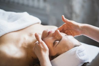 Woman having skin treatment near Hope Island