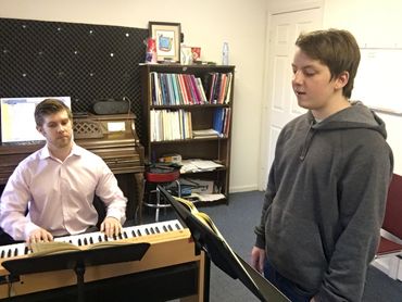 James Myers working with a voice student in his studio
