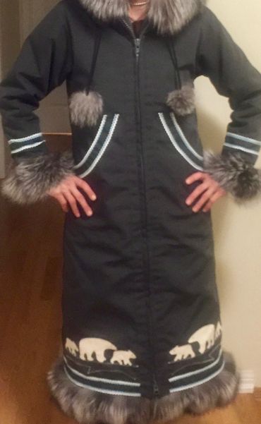 The traditional Arctic look. Rickrack (the wavy ribbon) and fur pom-poms too!