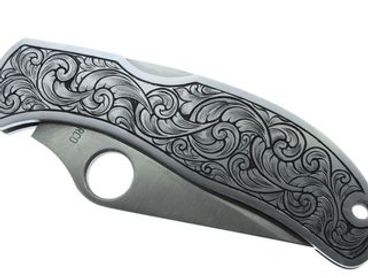 Hand-engraved folding pocket knife.
