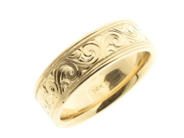Engraved yellow gold ring.