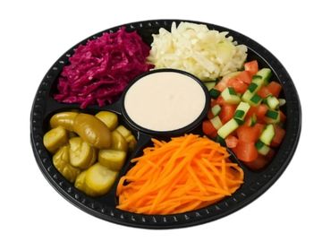 Fresh Israeli salad platter with tahini, pickles and crisp vegetables in Winnipeg.
