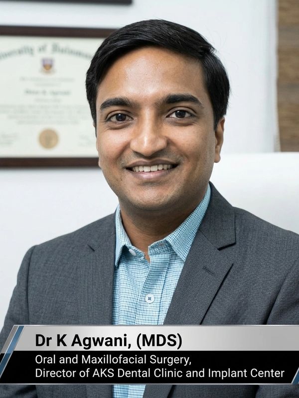 Portrait of Dr. K Agwani, oral and maxillofacial surgeon.