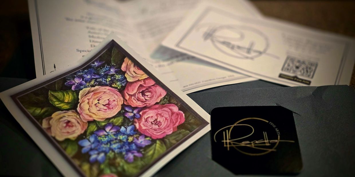 A floral card and some documents with a logo.