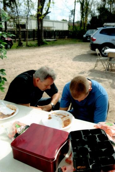 Two men in silent contemplation