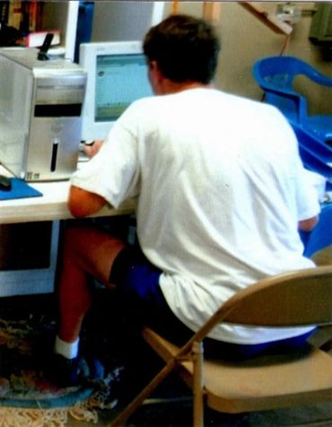 A man using a computer