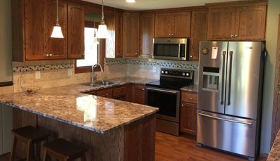 Milless Interiors custom designed kitchen remodel! Full service general contractor! 