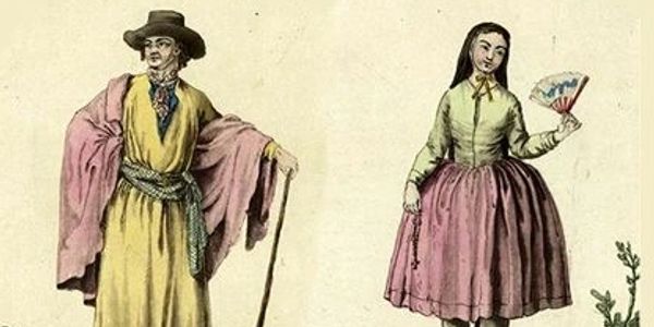 Historical costumes of a man and woman in traditional attire.