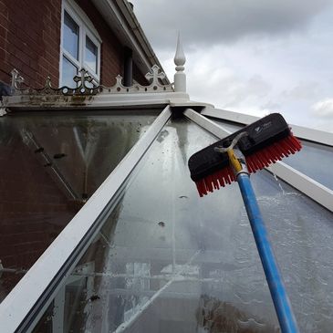 Cleaning Conservatory roof with water-fed pole system