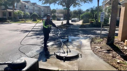 Pressure Washing Sidewalks and Roads