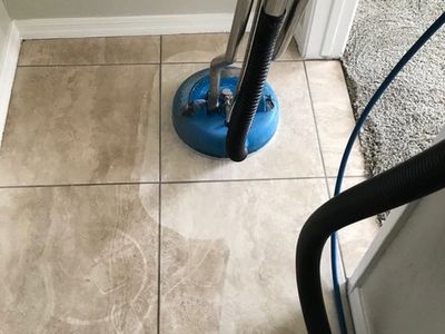 Dirty tiles being cleaned