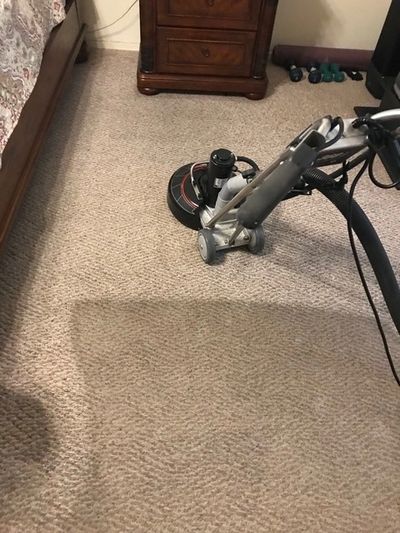 Carpeting in a room being cleaned