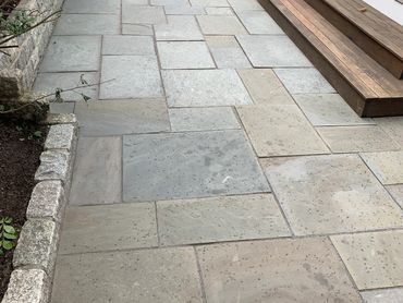 Modern patio with sleek design and minimalist features.