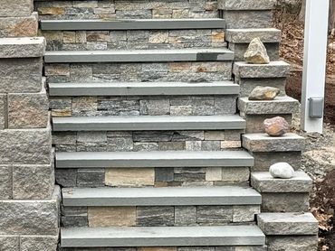 Gorgeous natural stone veneer stairs.