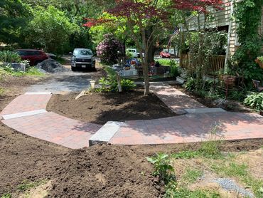 Gorgeous granite step pathway expertly designed around the needs of the owner.