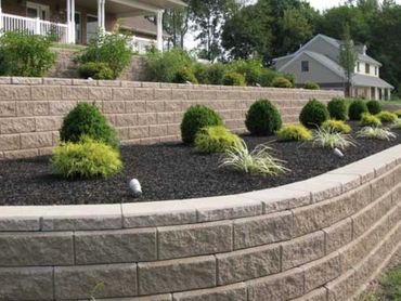 Elevate your landscaping with our custom build retaining walls.
