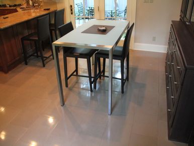 Man-made concrete tiles polished and restored by floorrescue in Dallas TX