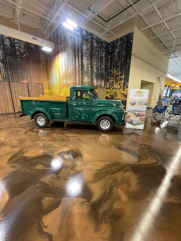 Metallic Epoxy floors for the entryway for this retail location at FunTown RV Corsicana, Texas
