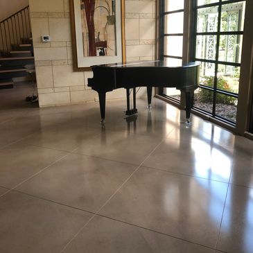 Cement Toppings that were scored and polished over a bad concrete slab for new construction