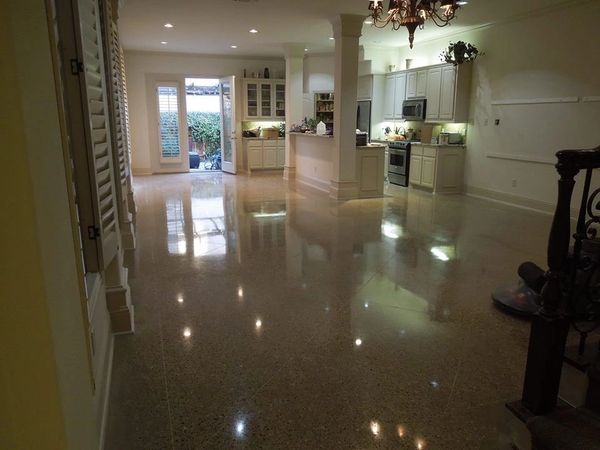 Polished Concrete flooring in Dallas Texas, stained concrete flooring removed. scored diamond design